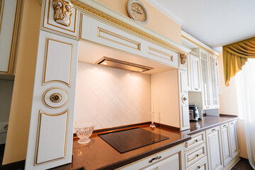 built-in hob. The interior of kitchen in a classic style. 