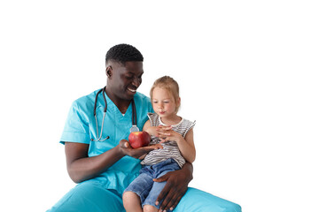 children's African-American doctor tells a little girl about proper nutrition holding an apple in her hands.