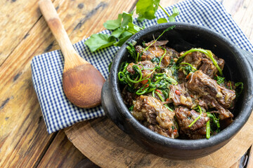 Oxtail with cress. Typical dish of Brazilian cuisine 
