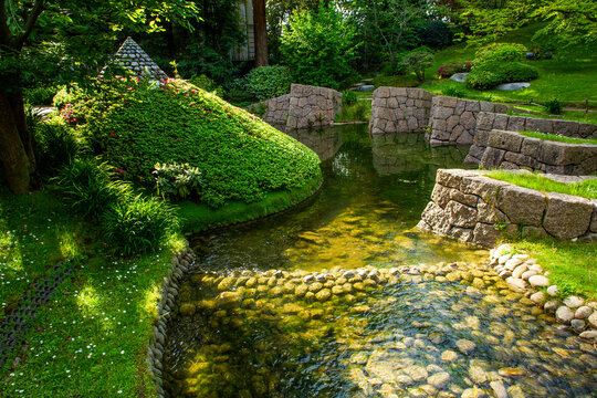 Stream  and some  pond in japanese  garden in Albert Kahn park