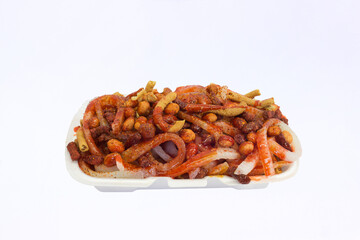 Preparado de churros con cacahuates y cueritos salsa y dulces