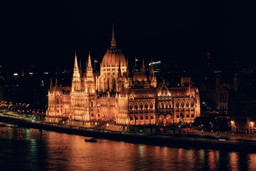 Hungarian Parliament and Danube river at night, Budapest, Hungary.