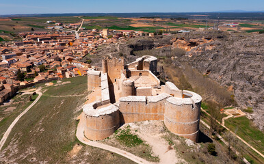 Drone photo of Berlanga de Duero's castle and town. Restored remains of medieval stronghold.