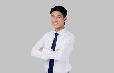Portrait businessman with crossed his arms standing isolated on white background, young asian business man is manager or executive having confident is positive with success.