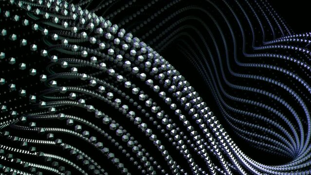 Abstract complex shape of small metal balls on a black background. Design. Spinning bended 3D figure of tiny particles.