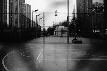 Black and white photos of an empty basketball court