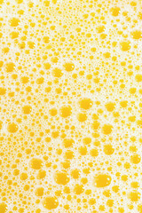 Closeup of splashing orange juice, top view. Splash of fresh sweet orange, mango, fruit juice. Freeze motion of pouring orange juice .