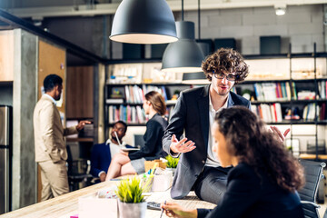 Group of business meeting and discussing strategy with startup project analysis finance process.Success business people plan and brainstorm marketing idea with document in office.Teamwork