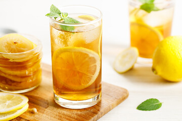 glass of ice lemon tea with mint.