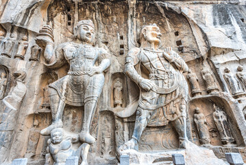 Longmen Grottoes or Longmen Cave with Buddha's figures are Starting with the Northern Wei Dynasty in 493 AD. It is one of the four notable grottoes in China, located in Luoyang City, Henan Province.