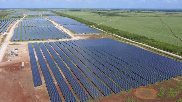 Panoramic view of El Soco solar photovoltaic park of San Pedro De Macoris in Dominican Republic. Aerial drone pov