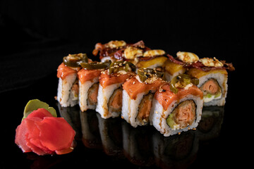 sushi on a black background