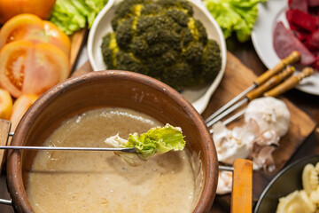 ingredients for bagna cauda sauce with cream and anchovies