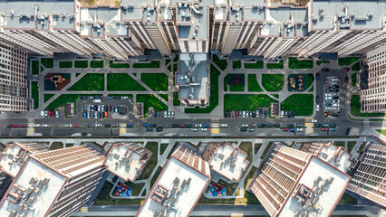 aerial top view of a courtyard of a high-rise residential building with a parking lot © Mr Twister