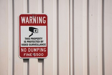 warning property under video surveillance sign