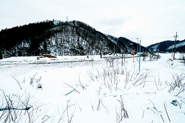 View of Nature and architecture near the railway of winter season in Japan 