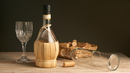 old craft bottle of wine on wooden surface - obrazy, fototapety, plakaty