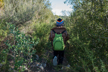 healthy child walking in the mountains exercising