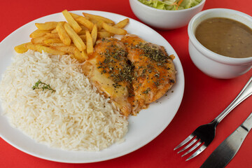Meal - Chicken Parmigiana, rice, beans, salad and fries