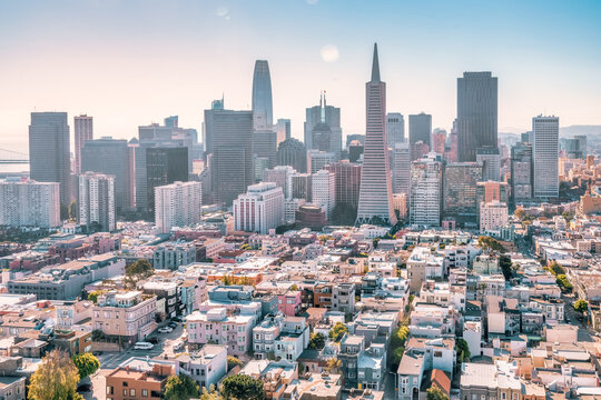 Beautiful aerial view from the Coit Tower to downtown San Francisco, magnificent skyscrapers of the famous American city. Photo edited in pastel colors.