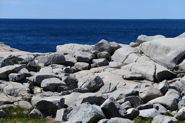 grey rocks on the blue coast