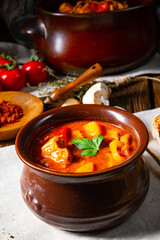 Hungarian goulash soup in a cauldron or pot