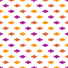 オレンジ色と紫色のキャンディのシームレスパターン