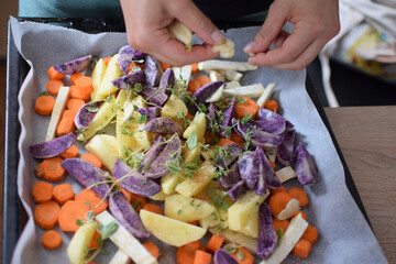 Tray with vegetables cut and ready to roast.
