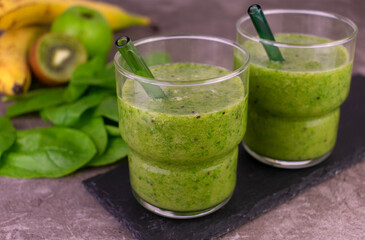 Glass of green healthy smoothie. Raw vegan food.
