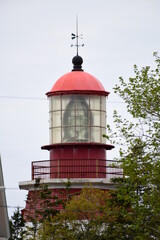 red lighthouse on the coast