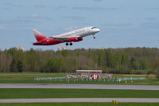 SAINT PETERSBURG, RUSSIA - MAY 20 2022: Airplane Sukhoi Super Jet 100 "Elista" (RA-89178) of Rossiya - Russian Airlines takes off in Pulkovo airport on a May day