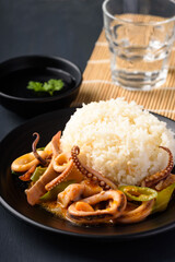 Stir fried squid with salted egg york and cooked rice, Thai food