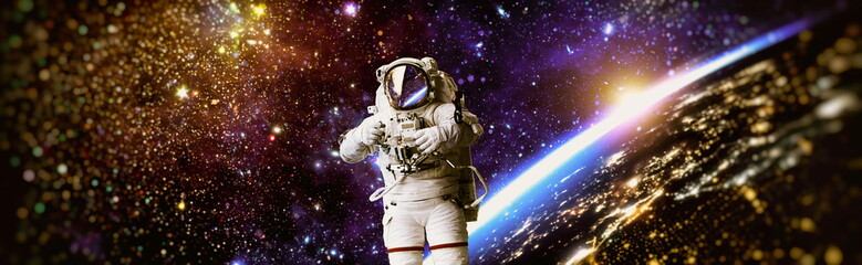 Picture of astronaut spacewalking with glowing stars . Astronaut in outer space. Elements of this...