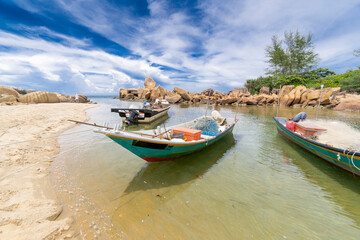 Fototapeta na wymiar Fishing boat at pantai penunjuk, Kijal Beach, Kemaman located in Terengganu, Malaysia.