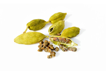 Cardamom pods and seeds isolated on white background
