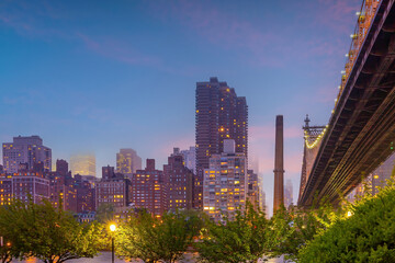Manhattan city skyline cityscape of New York with Queen Bridge