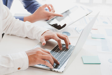 Business men meeting and discuss work project at office desk. Business professional teamwork coworkers discussing information document at table. Business corporate partnership concept.