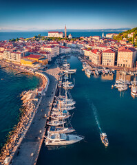 Last light glowing Slovenia Adriatic coast with beautiful Venetian architecture. Stunning morning...