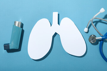 Concept of World Asthma Day on blue background