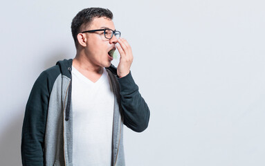 Handsome man with bad breath and halitosis problem, People with bad breath problem, Concept of person with halitosis and bad breath - obrazy, fototapety, plakaty