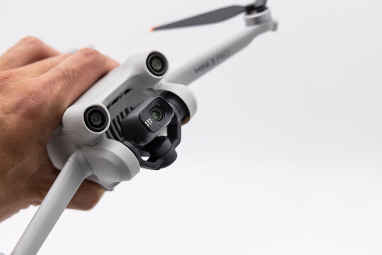 Front part of the DJI Mini 3 Pro drone held by hand, June 09, 2022, Germany