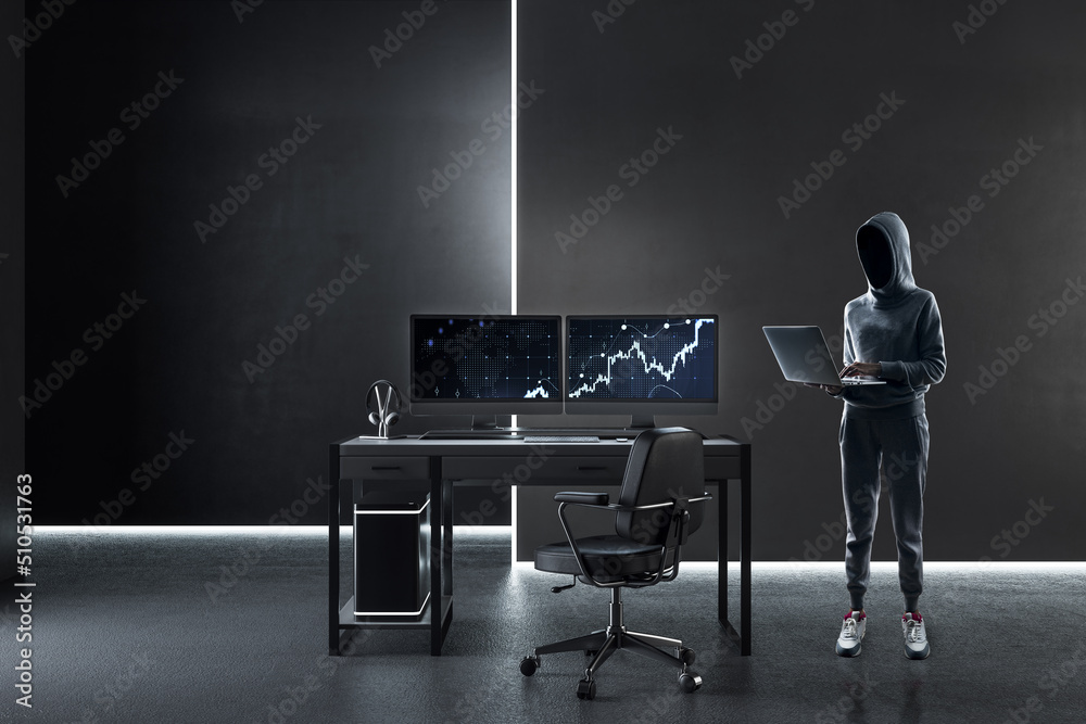Poster Hacker using laptop in modern concrete office interior with workplace, equipment and tech background on computer screen. Hacking and malware concept.