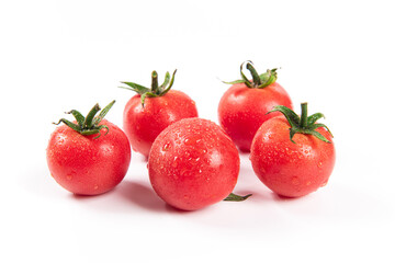 pile of cherry tomatoes isolated on white background.