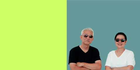 Fototapeta premium Asian senior elderly couple happy smile expression with sunglasses copy space isolated