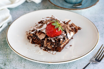 Chocolate cake. Cake with chocolate chips and chocolate sauce. close up