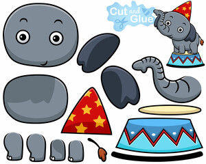 Vector illustration of cartoon elephant in circus show. Cutout and gluing