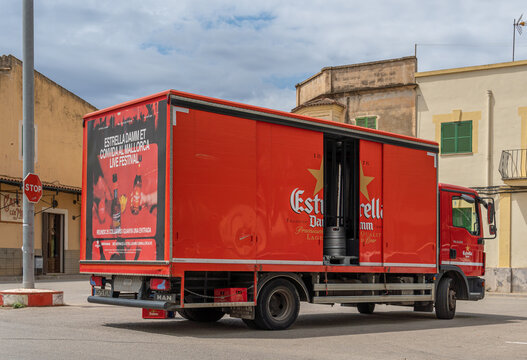 Red Beer Delivery Truck Of The Brand Estrella Damm Parked