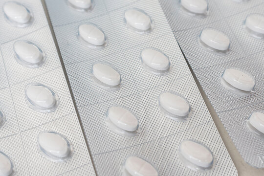 Blister packs of Cetrizine tablets. Antihistamine medication for sale at a drugstore or pharmacy.