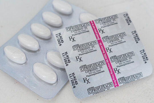 Philippines - May 2022: Blister packs of Ciprofloxacin tablets. 500 mg antibacterial treatment. Medicine for sale at a drugstore or pharmacy.