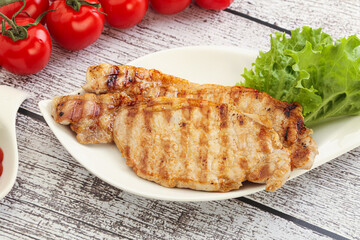 Grilled pork steak with ketchup